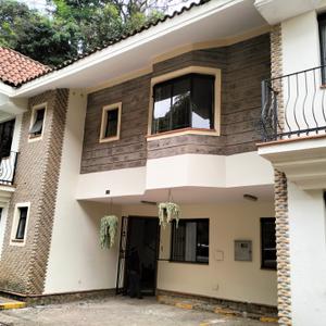 it is perfect blend of modern 5bedroom  town house  . characterized by the latest design and finishes.
it has the following numerous features
staff quarter for one
large lounge cum dining and adjoining balcony
large windows to maximize natural light and air circulation
 two modern kitchen fitted with cooker and oven
has a dhobi area
wooden flooring except the wet areas that contain ceramic tiles
each bedroom has a high quality inbuilt wardrobe.
master bedroom has bath tub and wadrobes
each bedroom has a sliding windows
internet connected,
alarm systems intercom.
garden well manicured  and swimming pool
CCTV cameras around
perimeter wall with electric fence round
24 hours security from KK security company