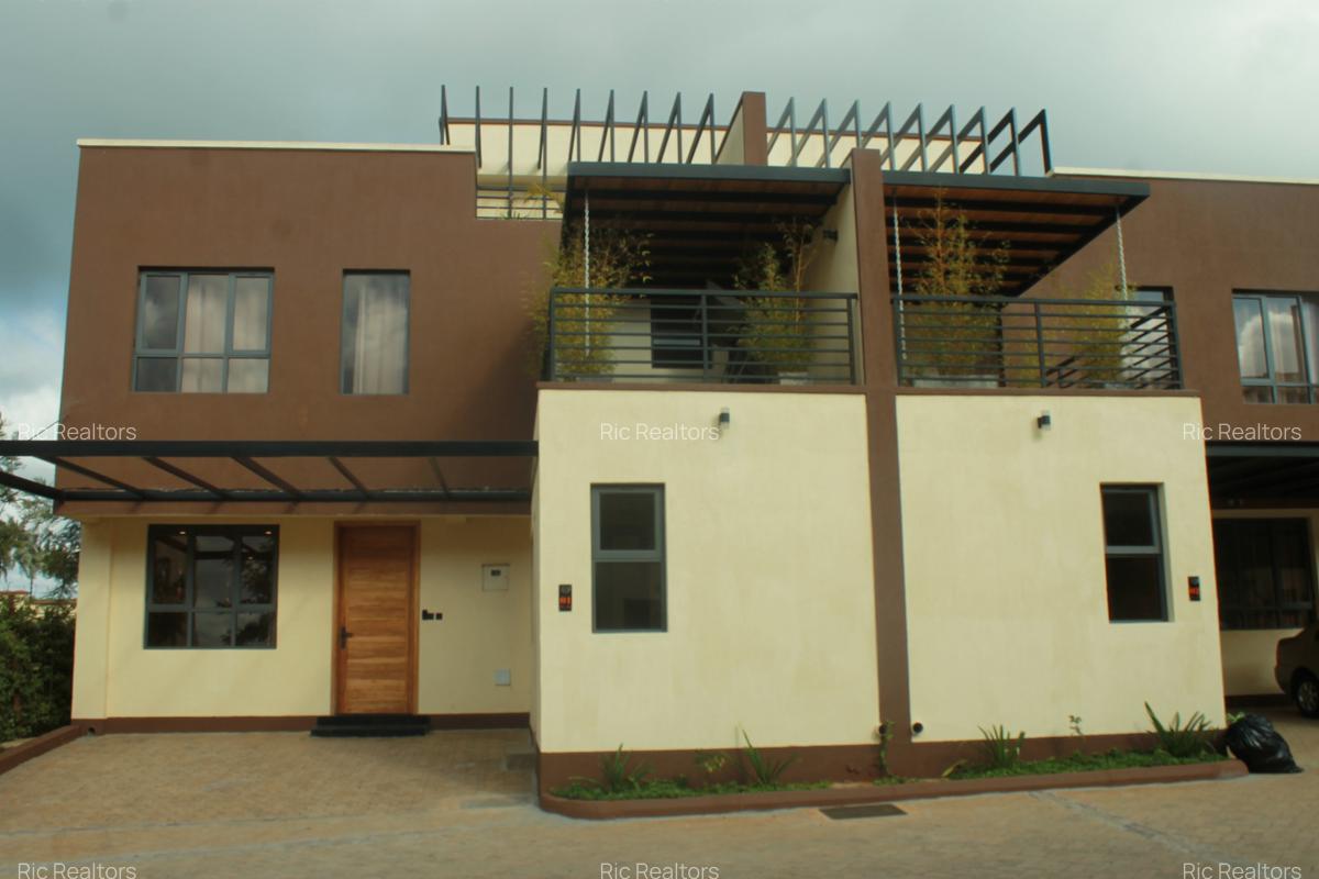 4 Bed Townhouse with En Suite at Banana (Raini Road) - 2