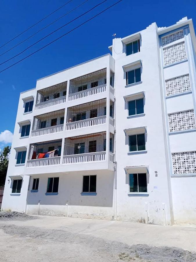 Commercial Property with Service Charge Included at Kiembeni - 1