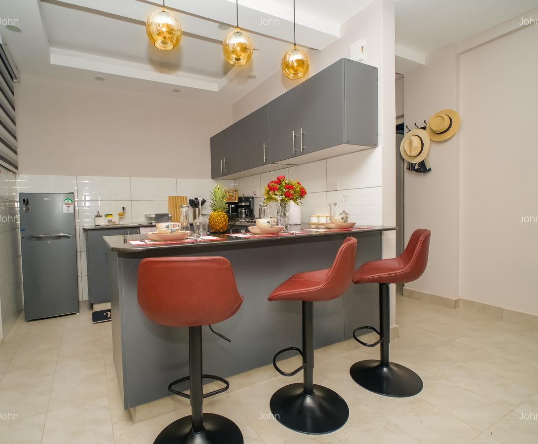 Serviced 2 Bed Apartment with En Suite at 1St Ave - 12