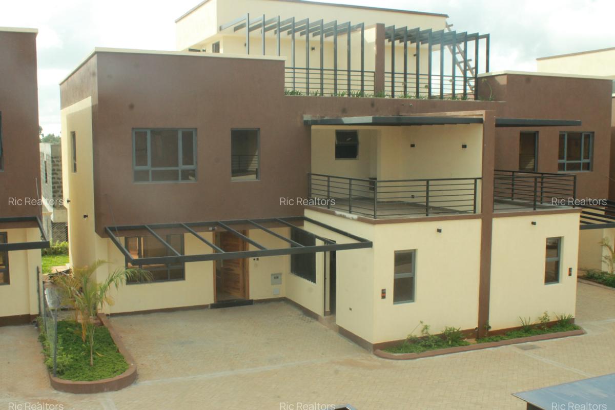 4 Bed Townhouse with En Suite at Banana (Raini Road) - 3