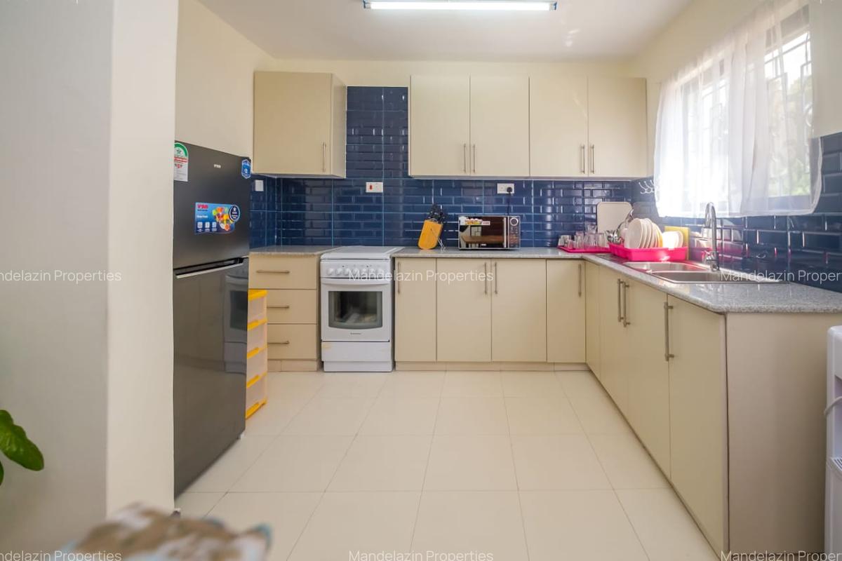 Serviced 1 Bed Apartment with En Suite at Raphta Road - 12