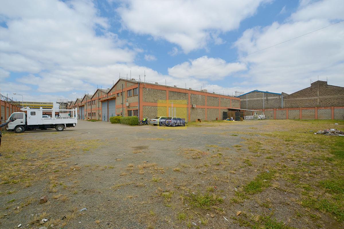 Warehouse with Electric Fence in Industrial Area - 9