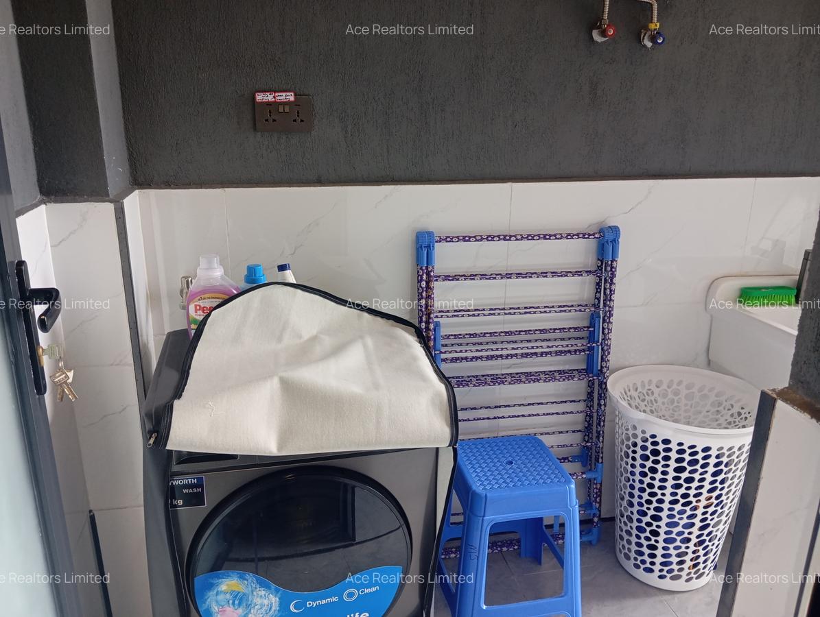 Serviced 1 Bed Apartment with Swimming Pool at George Padmore Road - 11