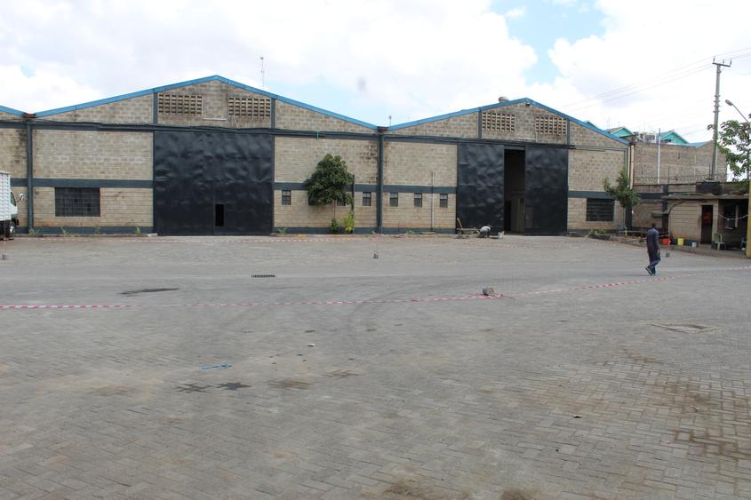 Warehouse with Backup Generator in Industrial Area