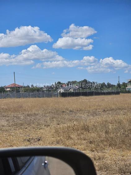 Land at Nairobi -Namanga Highway