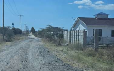 Land at Nairobi -Namanga Highway