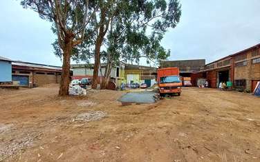 0.77 ac Warehouse with Parking at Zam