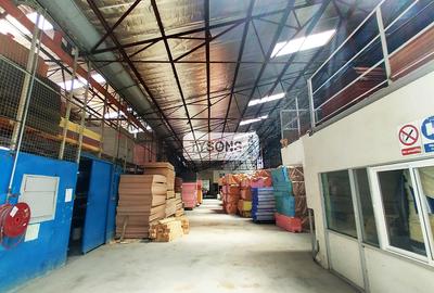 Warehouse with Backup Generator in Industrial Area