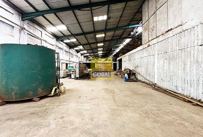 0.77 ac Warehouse with Parking at Zam