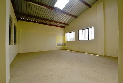 Warehouse with Electric Fence in Industrial Area