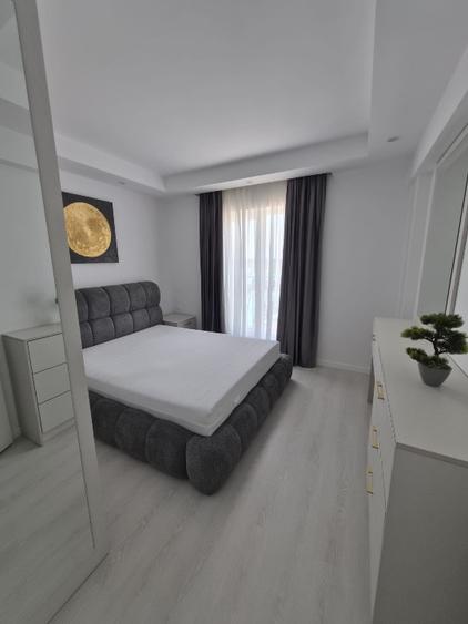 NOU 2 camere +parcare in Cosmopolis