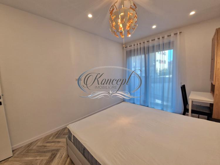 Apartament mobilat cu parcare subterana si terasa