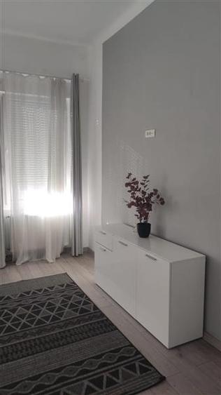 2 cam - zona Podgoria - la curte comuna