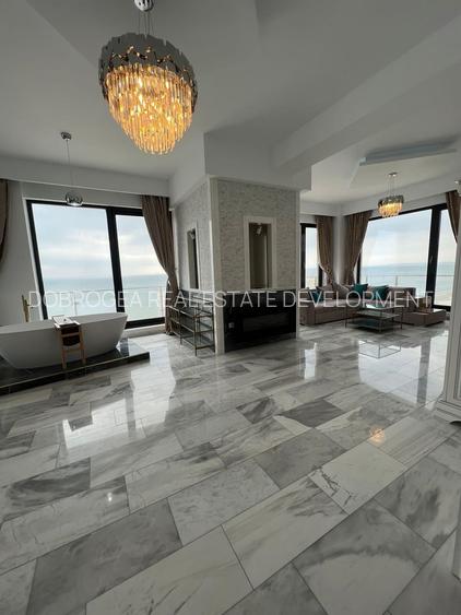 Penthouse mobilat lux , vedere frontală la mare - 9