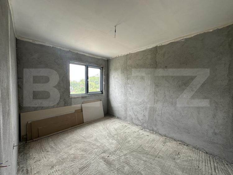 Casă cu garaj, 130 mp, teren 619 mp - zona Cionchesti