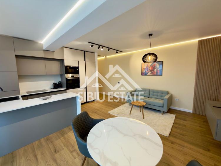 Apartament central finisare premium parcare subterana imobil nou