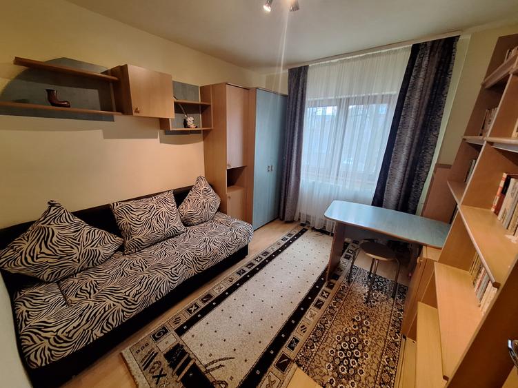 400 euro!!!Ap.cu 3 camere Et 1 cu centrala proprie Zona Bucovina