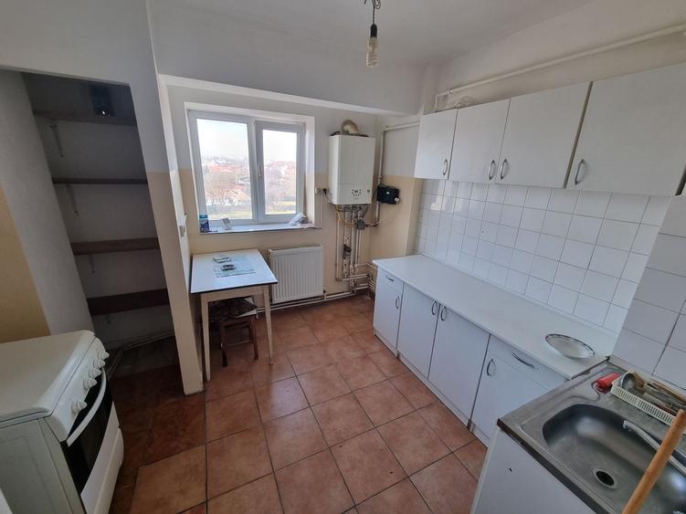 KM 5-garsoniera in bloc de apartamente
