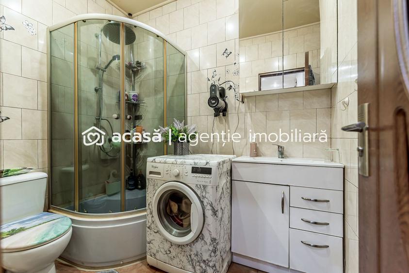 Apartament în centru cu acces auto și garaj propriu