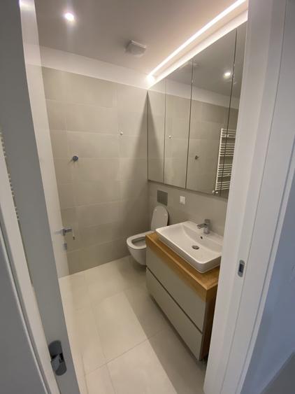 Apartament premium, parcare inclusa. Management profesional.