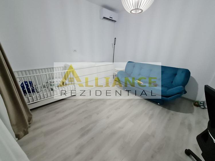 Mobilata si utilata-Panouri solare-4 camere-curte amenajată