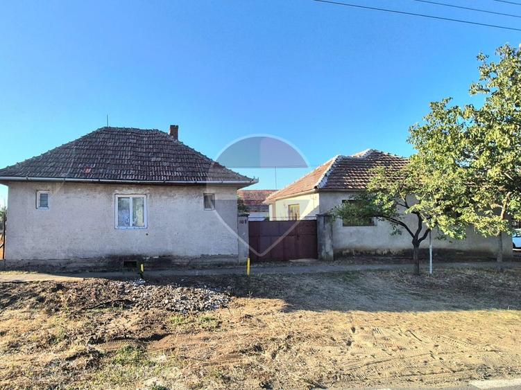 Proprietate cu teren 1.359 mp, poziție pe colț și utilități la strada