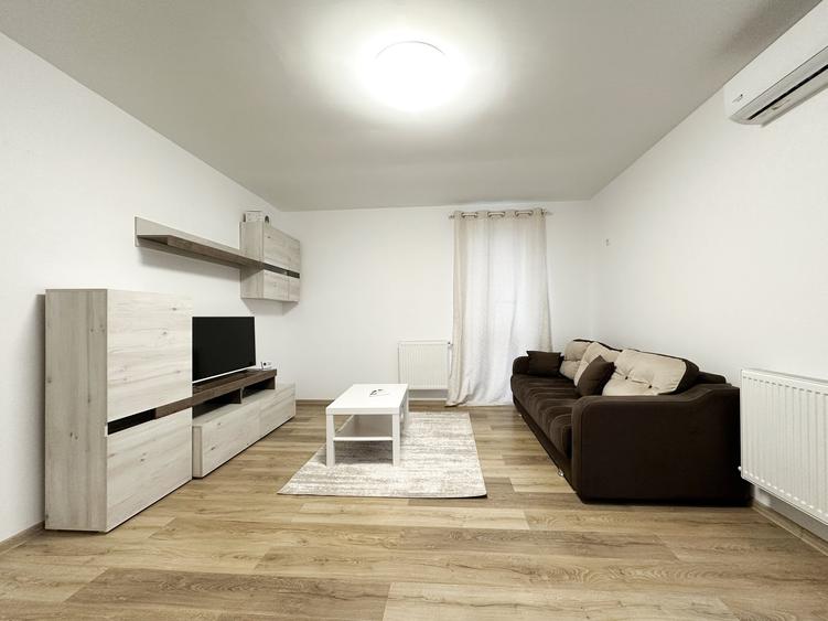 Apartament intr-un bloc retras, cu centrala si parcare