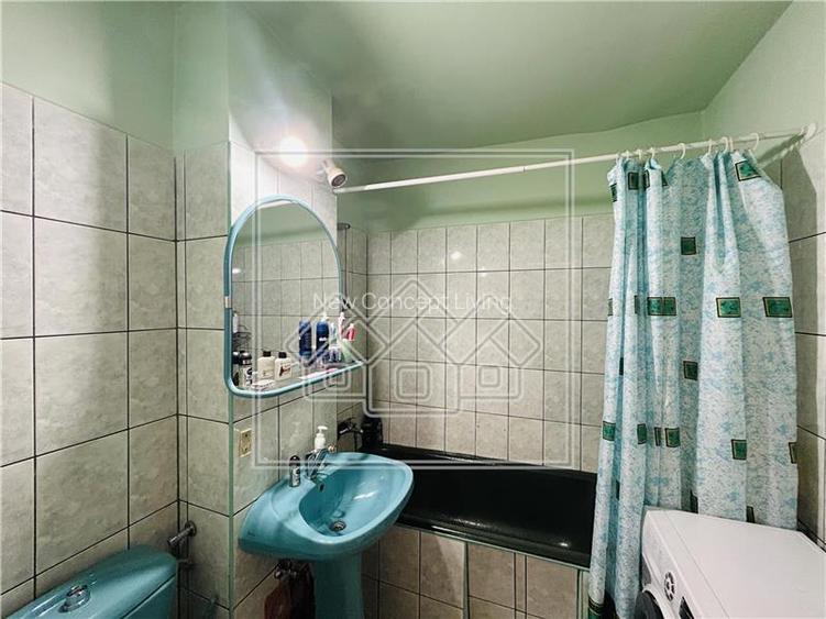 Apartament de vanzare in Sibiu - 3 camere, 2 balcoane + pivnita - - 13