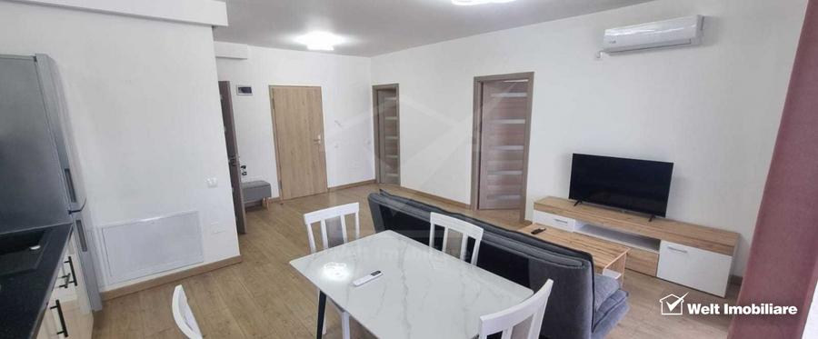 Apartament 2 camere balcon si parcare , la intrare in Floresti