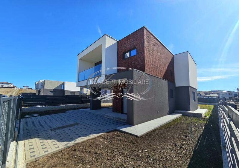 Locuinta moderna cu design cubic si curte plana in Dezmir - 3