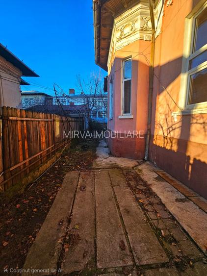 Casă cu arhitectură interbelică, 5 camere, teren 409 mp – Central - 51
