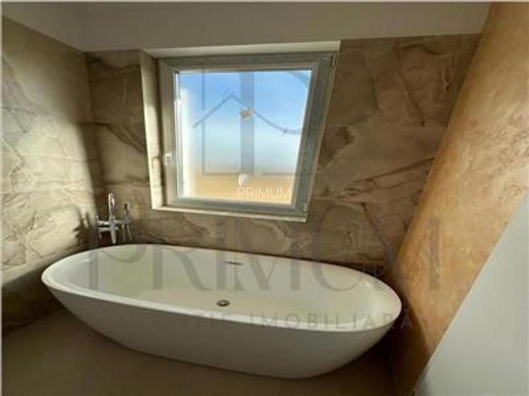 Casa individuala superba - zona linistita - bucatarie inchisa-  finisaje premium - 3