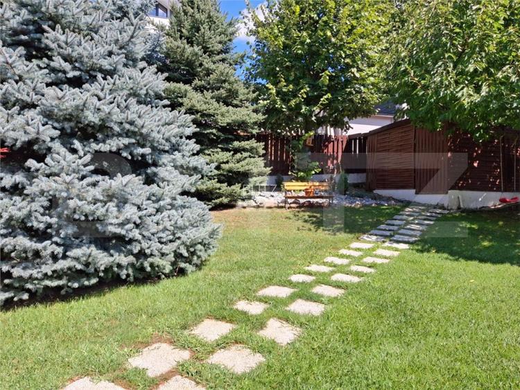 Proprietate eleganta cu teren mare si garaj in Bucium, perfecta pentru familie - 5