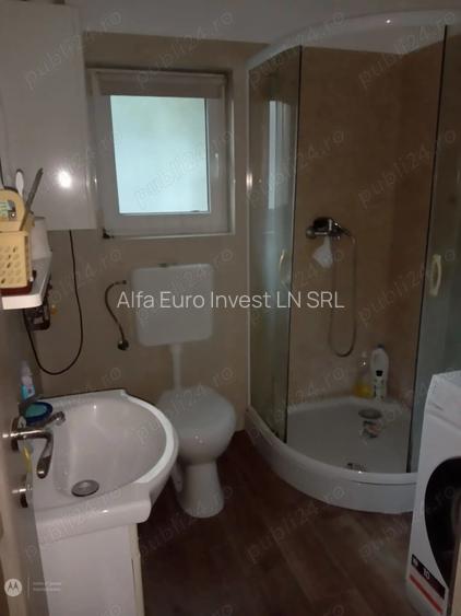 2 camere   in CASA  -central  -curte comuna-intrare separata - 2