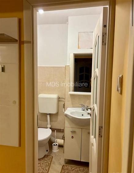 Decomandat cu 2 băi si 2 balcoane la etajul 3 - 10