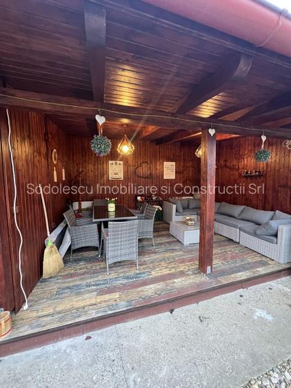 O căsuța cocheta, cu o atmosfera primitoare și calda - 7