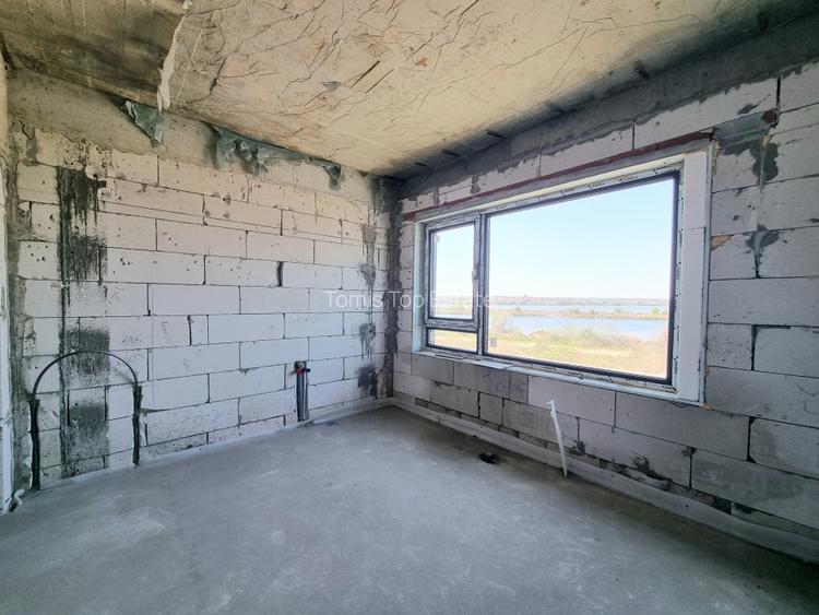 Casa P+1 in Navodari, cartier Midia Sat, vedere spre Lacul Tasaul - 12