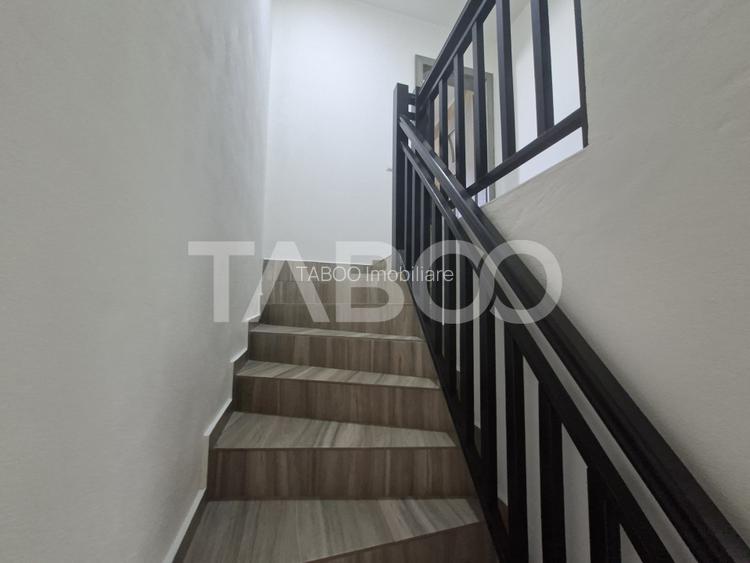 Casa de vanzare in Zavoi cu 3 camere 2 bai curte libera de 50 mp - 16