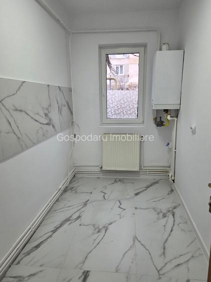 Apartament cu 2 camere parter zona Scoala Generala 2 Adjud- imbunatatit - 2