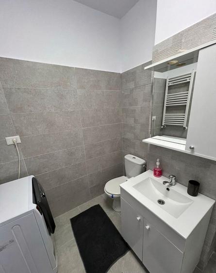 Vanzare apartament 2 camere cu terasă, parcare subterană, mobilat complet