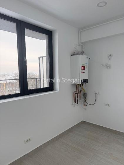 Garsoniera 36,4 mp + terasa 16,82 mp , Balotesti , Sos.Unirii 17 - 3