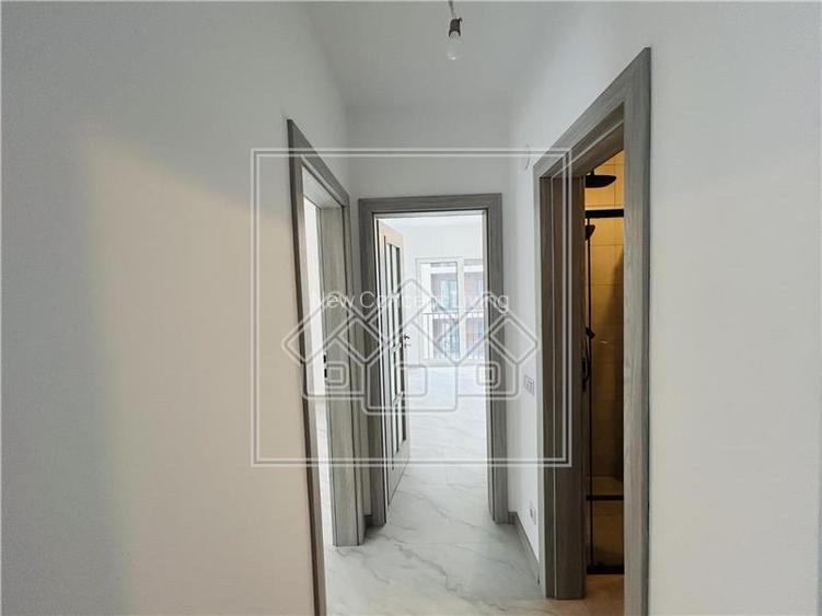 Apartament de vanzare in Sibiu - 3 camere, 2 bai, garaj, et 1-Turnisor - 16