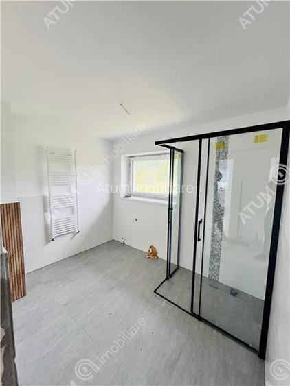 Casa individuala in Cisnadioara cu 4 camere 2 bai terasa teren 1170 mp - 8