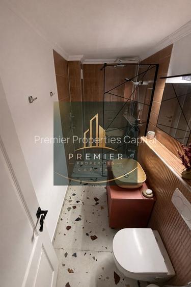 Apartament 2camere renovat complet Nerva Traian etaj 1 si 2 balcoane  sud - 8