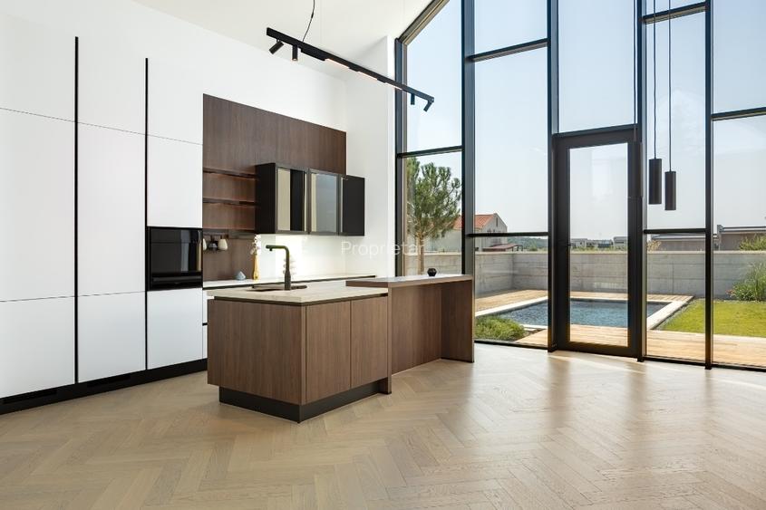 Casă Parter cu Design Minimalist și Piscină - 9