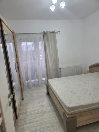 Vand in Unirii,strada Pomilor,apartament cu2 camere,open space,mobilat utilat.