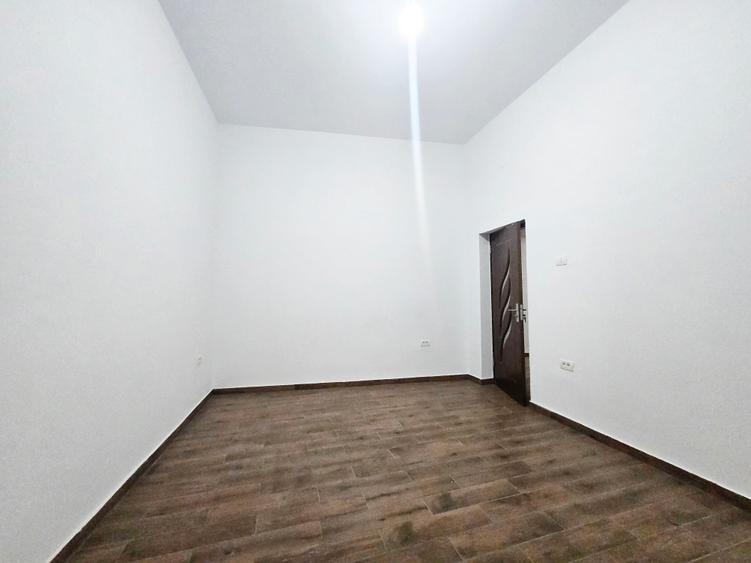 Apartament 3 camere cu centrală, parter – zonă centrală