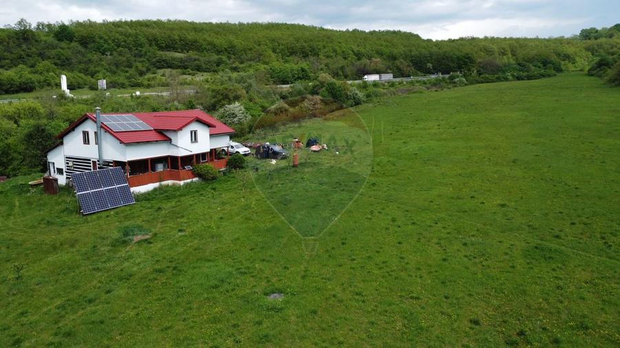 Proprietate OFF-GRID 5,76 Ha. Casa tradiționala lemn. Limită Cluj