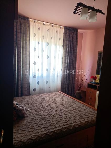 3 camere decomandate , centrala pe gaze, mobilat ,zona Dacia , pozitie excelenta - 8